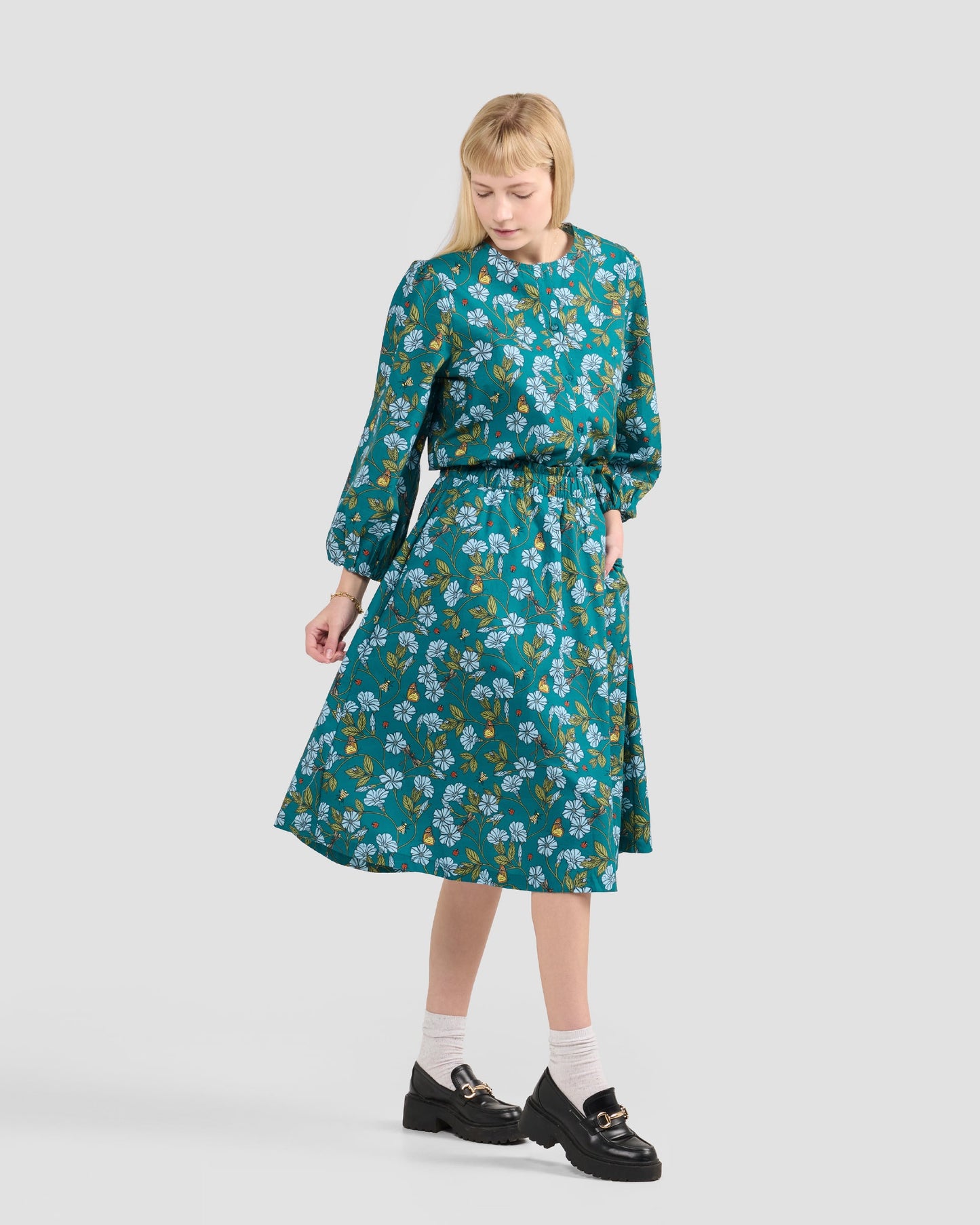 Women's Puff Sleeve Blouse With A Hand-Drawn Flora in Flight Print