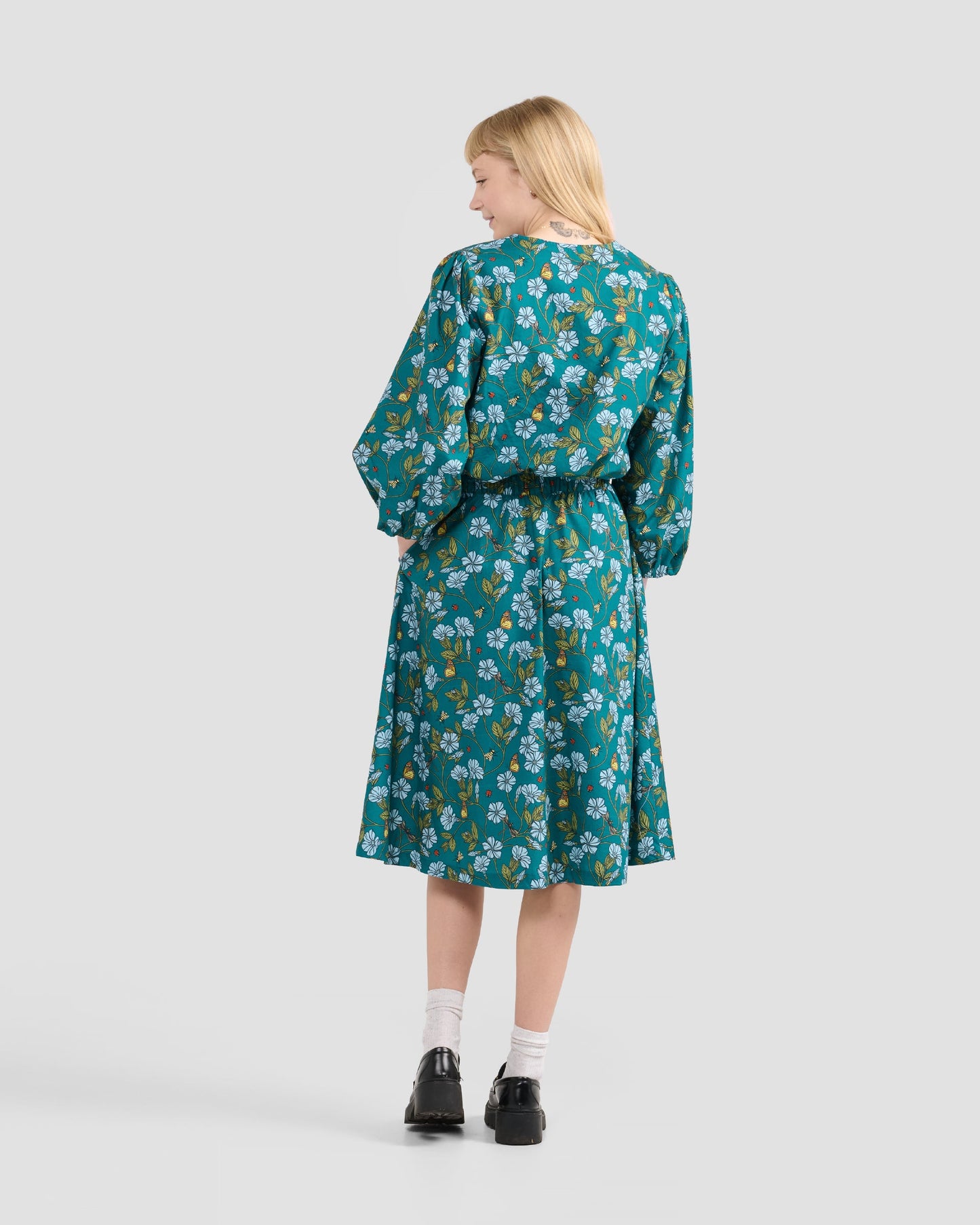 Women's Puff Sleeve Blouse With A Hand-Drawn Flora in Flight Print